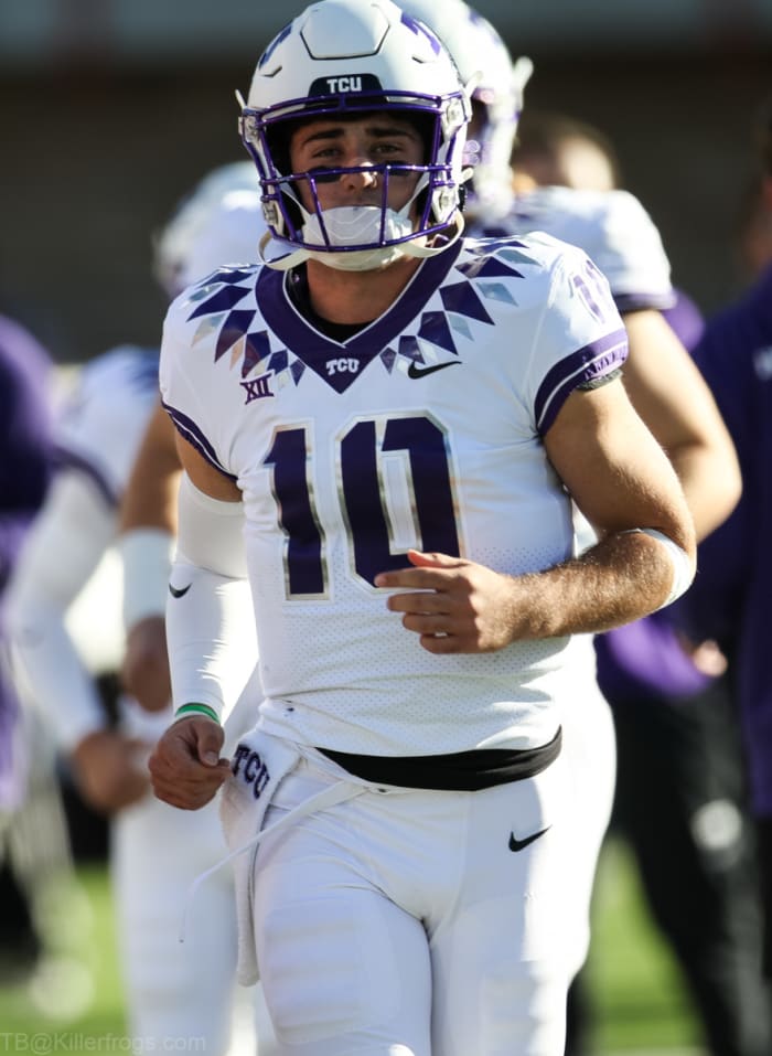 Josh Hoover warms up before the Texas Tech game.